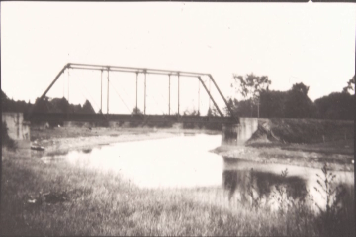 a black and white image across the river near Crysler as part of the Ottawa & New York Railway